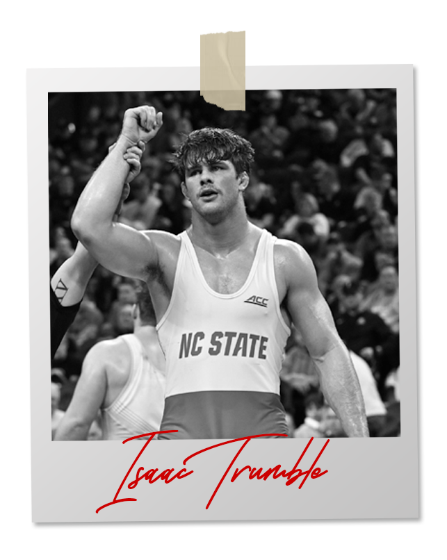 A black and white photo of a wrestler in an 