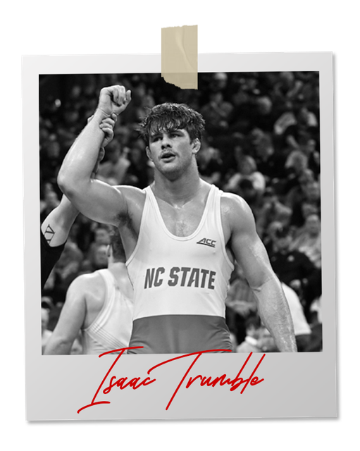 A black and white photo of a wrestler in an "NC State" singlet. Signature below reads "Isaac Trumble"