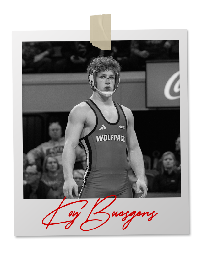 A black and white photo of a wrestler in an 