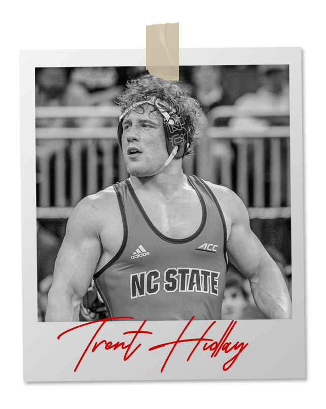 A black and white photo of a wrestler in an 