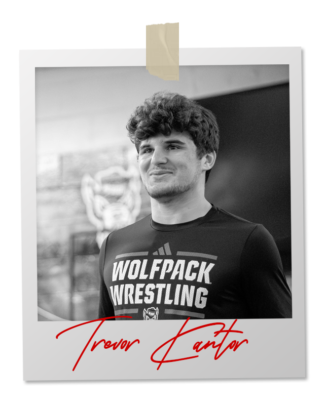 A black and white photo of a wrestler in an 