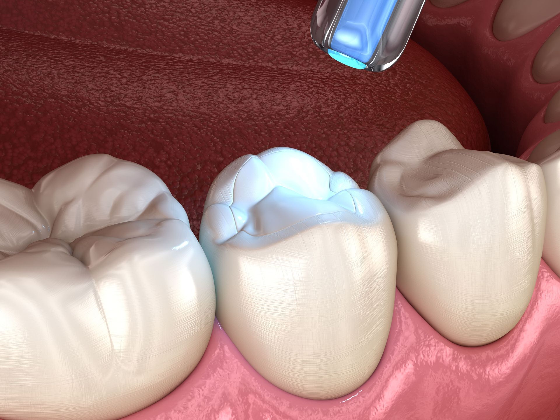 A close up of a person's teeth with a light shining on them