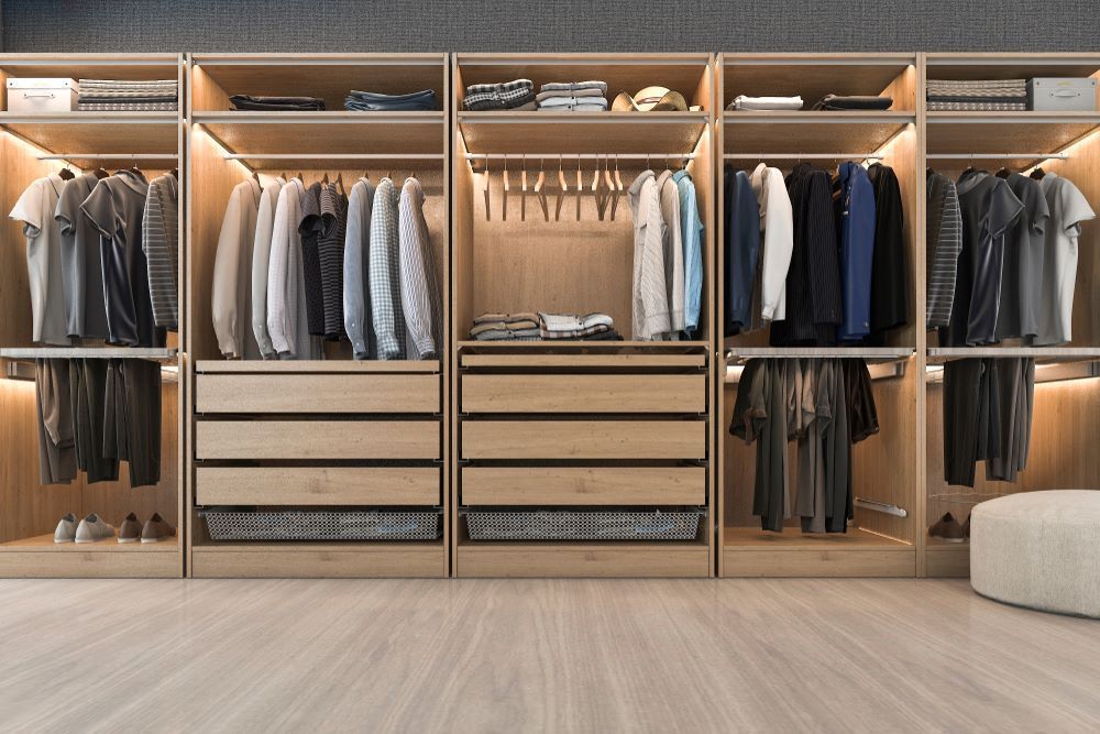 A Walk in Closet Filled With Lots of Clothes and Drawers — Wardrobe World In Paget, QLD