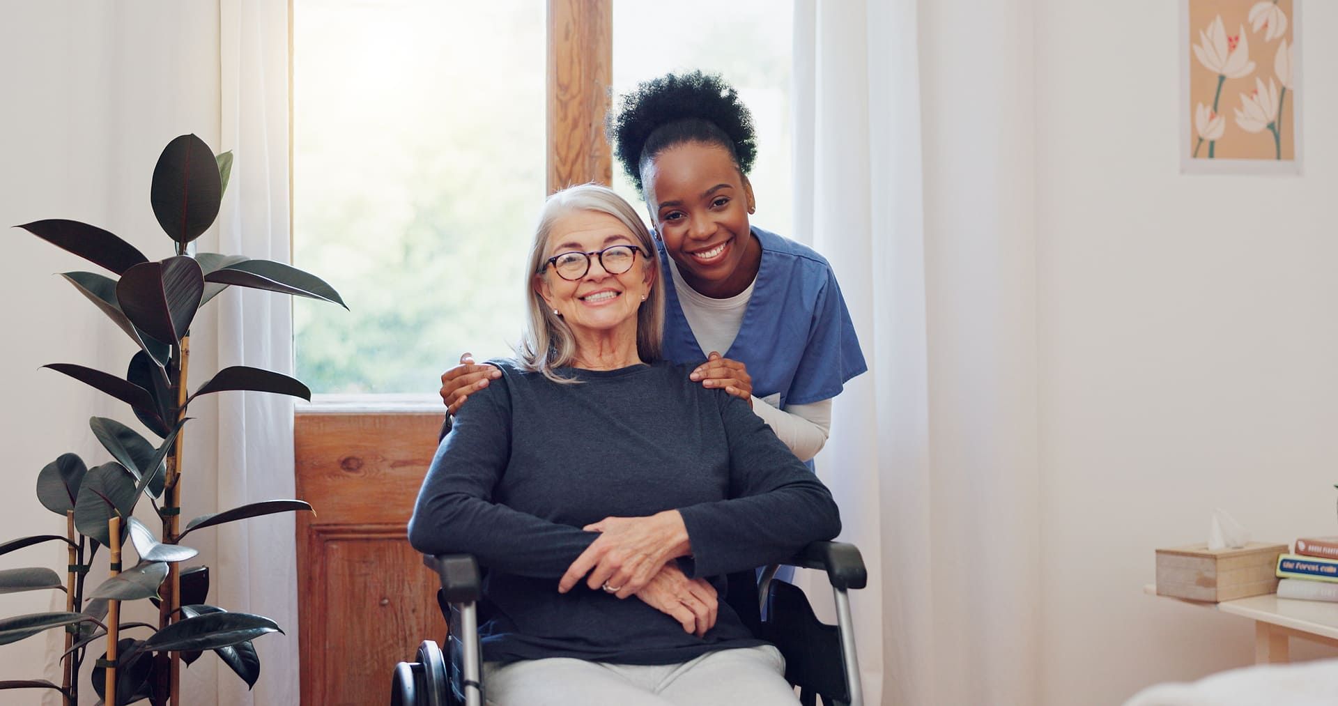 Senior care, nurse and old woman with wheelchair, portrait and smile in health at nursing home. Support, kindness and happy face of caregiver with elderly person with disability for homecare service