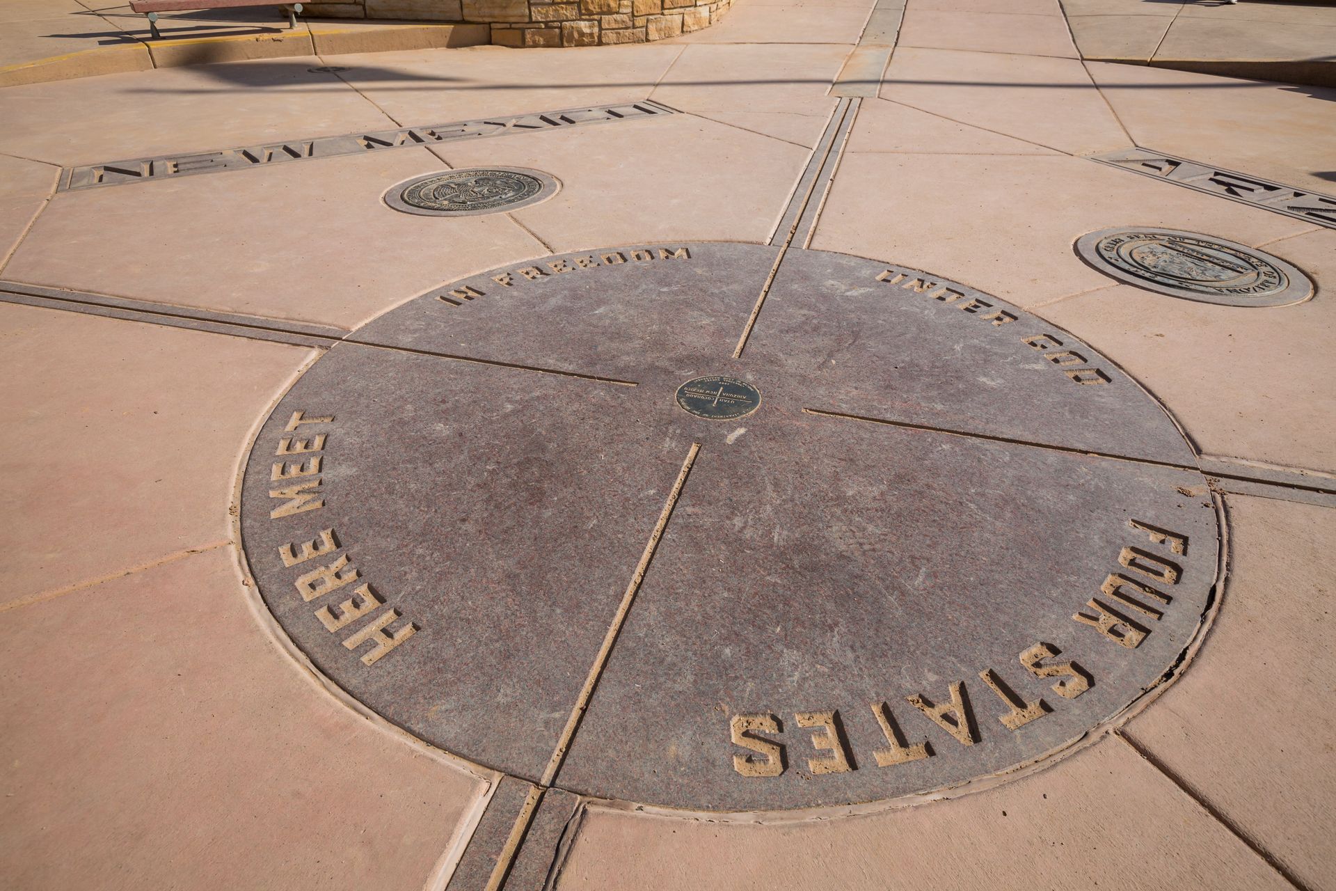 A circle on the ground that says four states