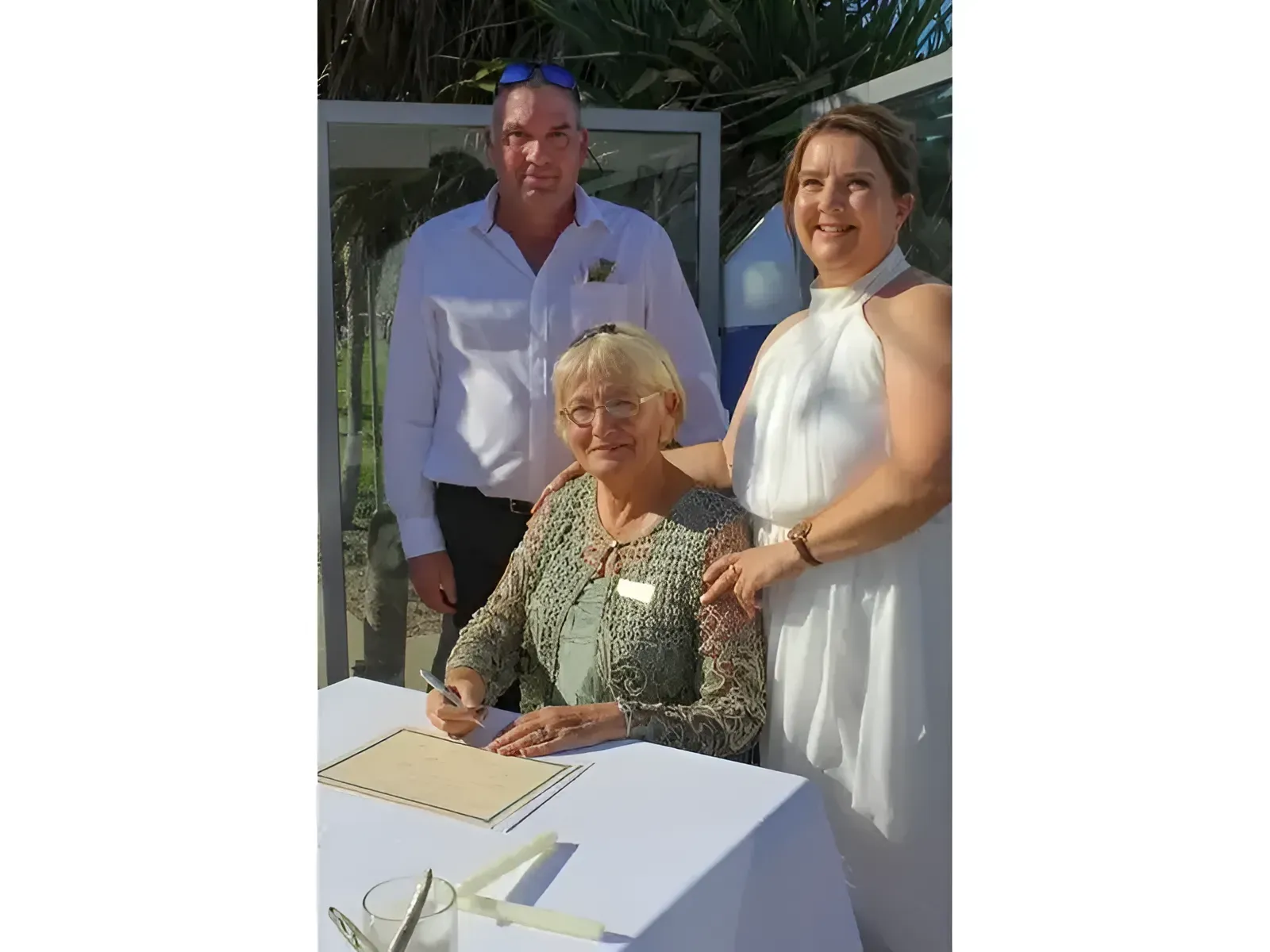 A Bride And Groom Pose For A Picture With Their Parents — Carolynn Farmer-Celebrant In Emu Park, QLD