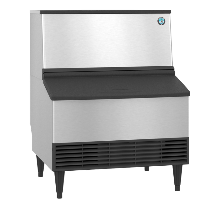 Stainless steel ice machine with black lid, vents, and legs; used in commercial settings.