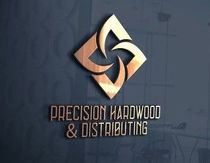 A logo for precision hardwood and distributing is on a wall