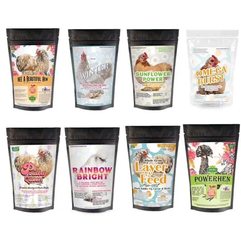A bunch of bags of chicken food including rainbow bright