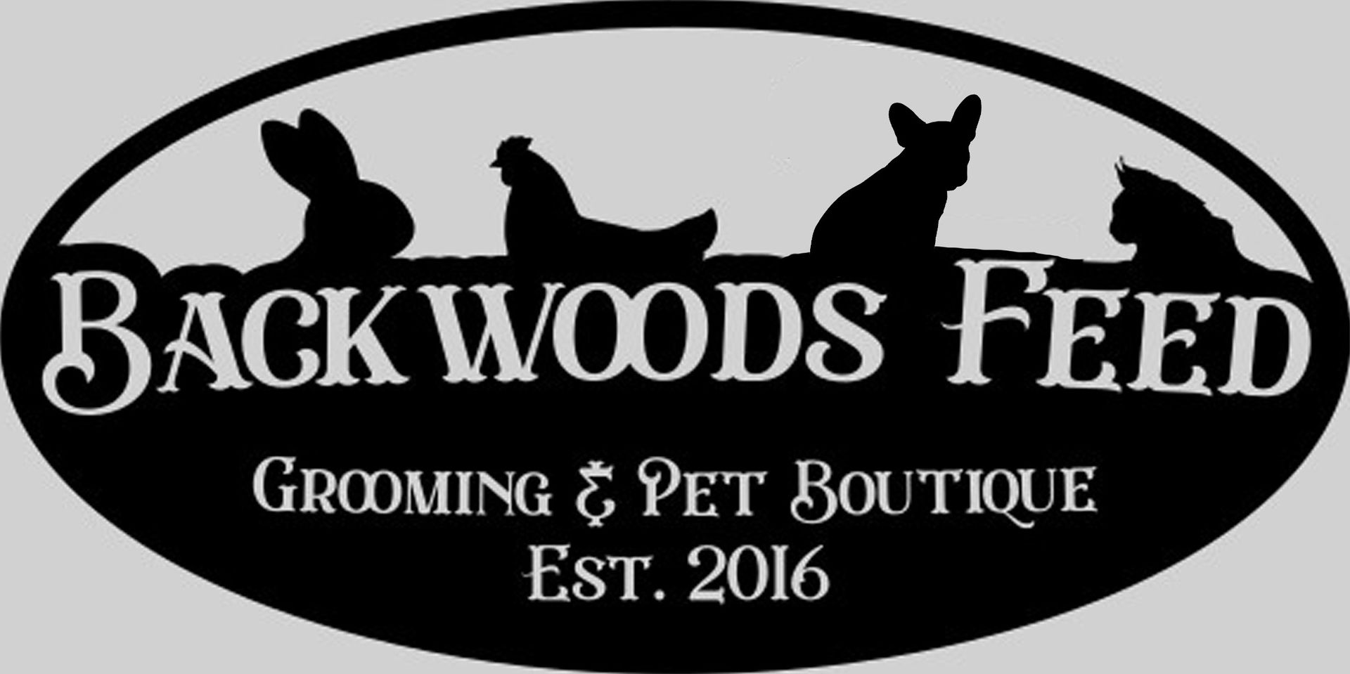 A logo for backwoods feed grooming & pet boutique