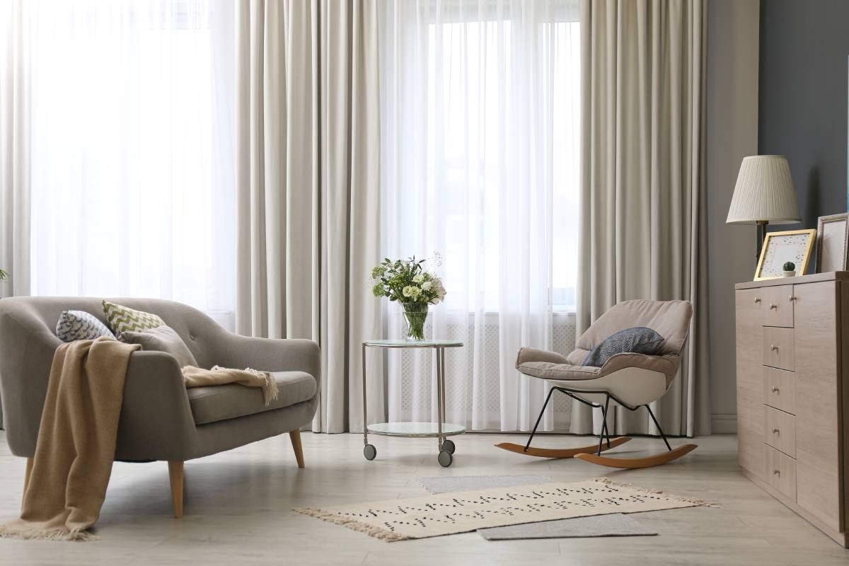 Custom beige drapery in a contemporary living room near Cumming, GA