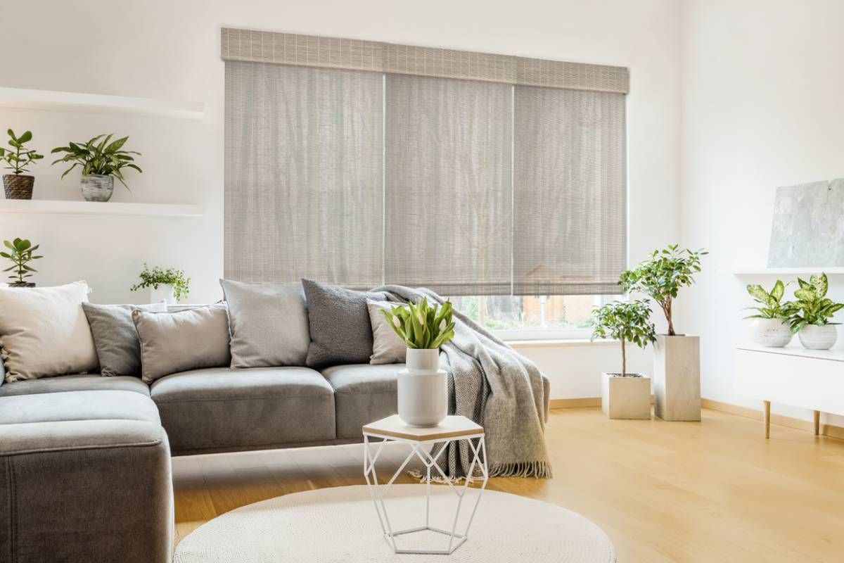 Modern living room with custom three window shades near Cumming, GA