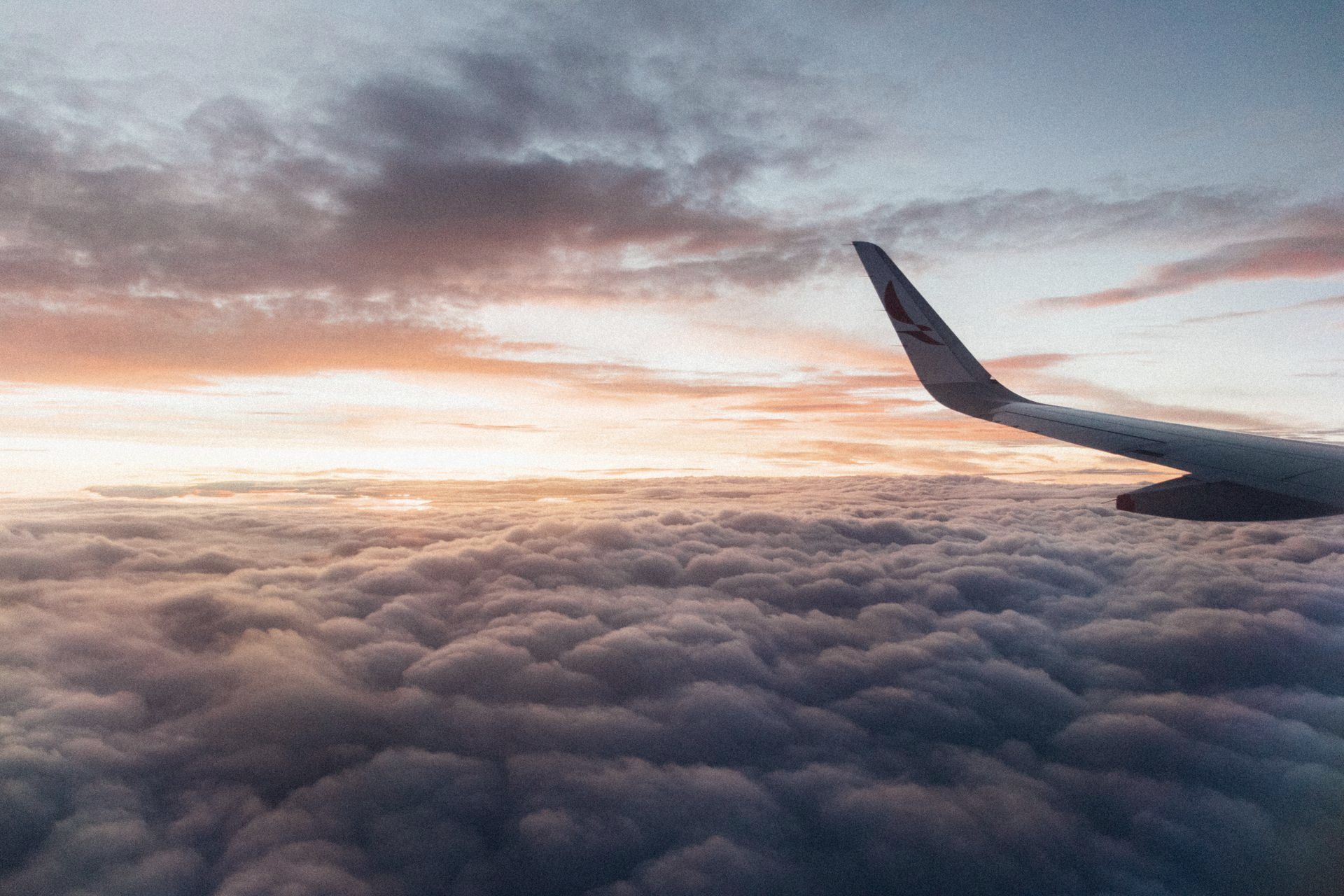 Airplane Wing on Top of Sea Clouds Airplane Wing on Top of Sea Clouds