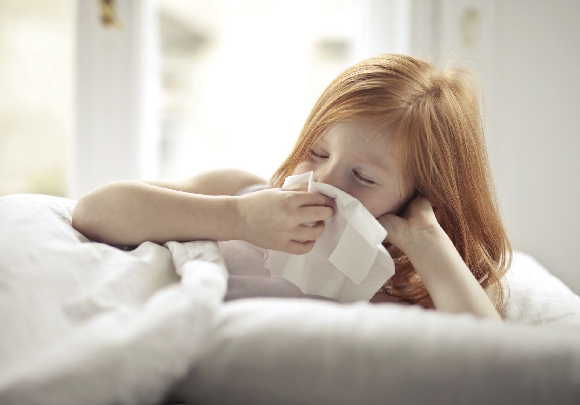 Sick Girl Wiping Her Nose with Tissue Sick Girl Wiping Her Nose with Tissue