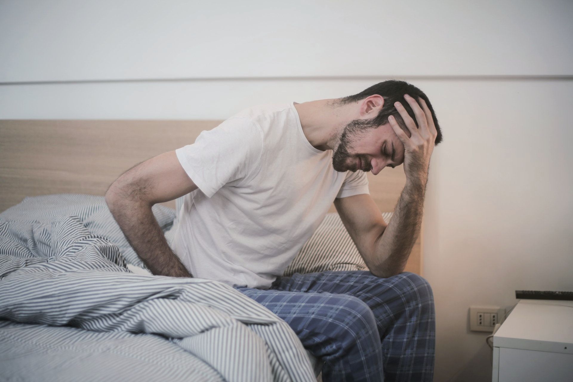 Man Suffering From Migraine Man Suffering From Migraine