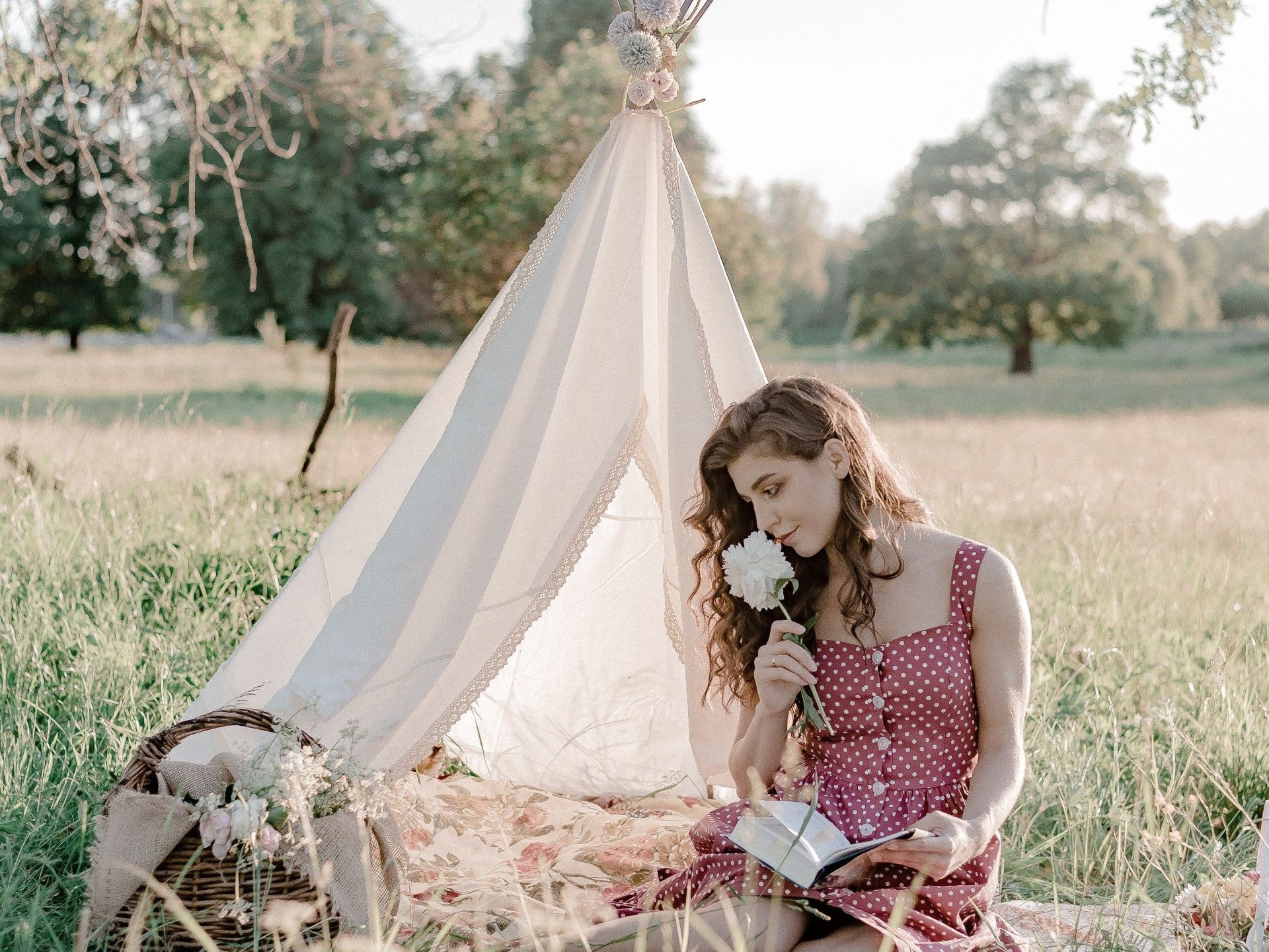 Woman Smelling Flowers