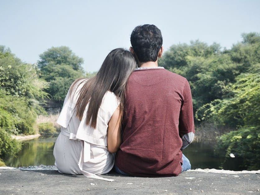 Back of Couple Sitting Together Back of Couple Sitting Together
