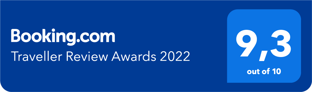 A blue sign that says booking.com traveler review awards 2022