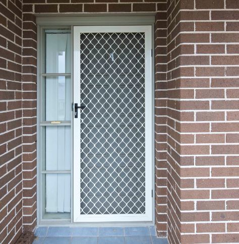 A White Security Screen Door with A Diamond Mesh Pattern — Suburban Security Screens in Currumbin, QLD