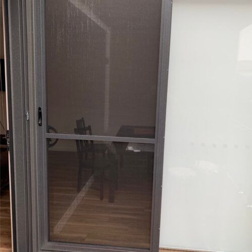 Dark Gray Sliding Screen Door Set in a Frame — Suburban Security Screens in Currumbin, QLD