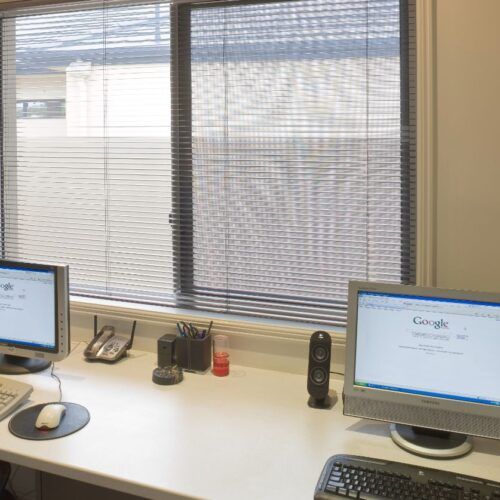 Two Computer Workstations With Keyboards — Suburban Security Screens in Currumbin, QLD