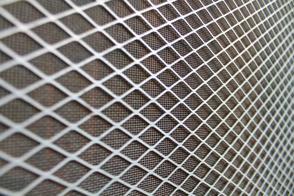 Close-up of White, Diamond-patterned Metal Mesh — Suburban Security Screens in Currumbin, QLD
