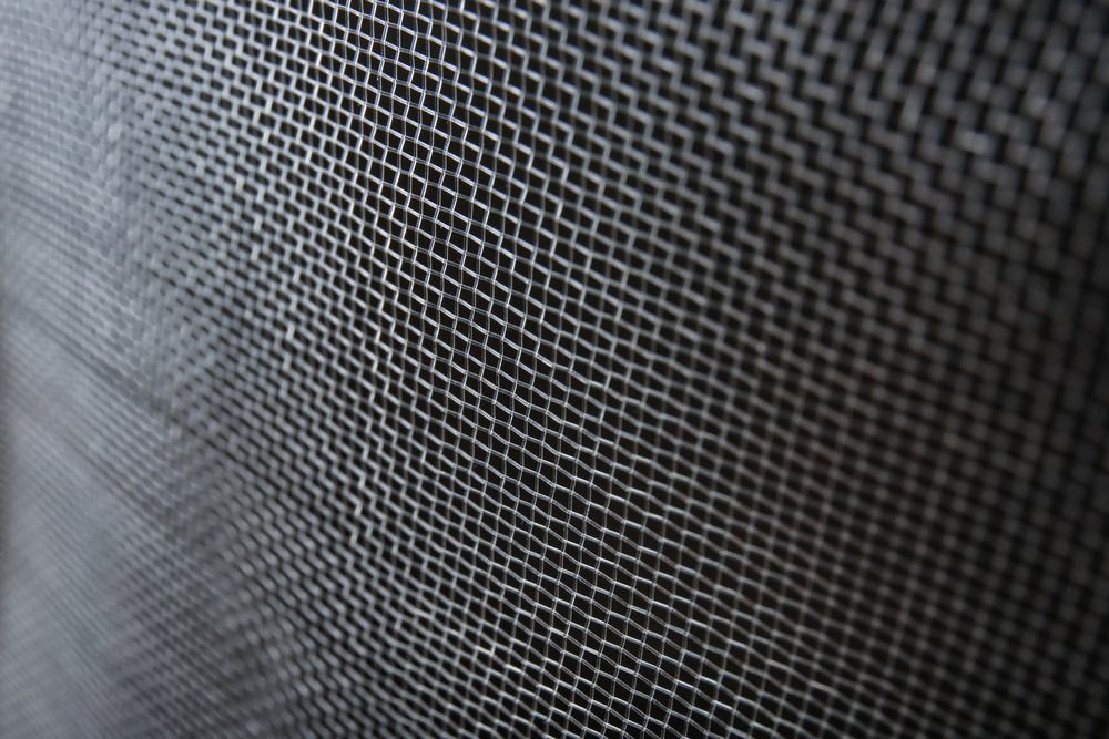 Close-up of a Black Mesh Screen With a Fine — Suburban Security Screens in Currumbin, QLD