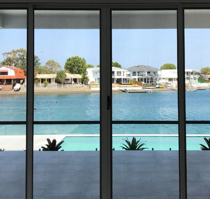 View Through Large Sliding Glass Doors — Suburban Security Screens in Currumbin, QLD