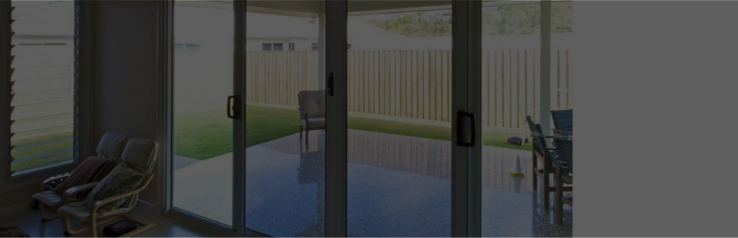 View From Indoors Through Sliding Glass Doors — Suburban Security Screens in Currumbin, QLD