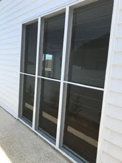 Exterior View of A Three-Panel Window with White Frames — Suburban Security Screens in Currumbin, QLD