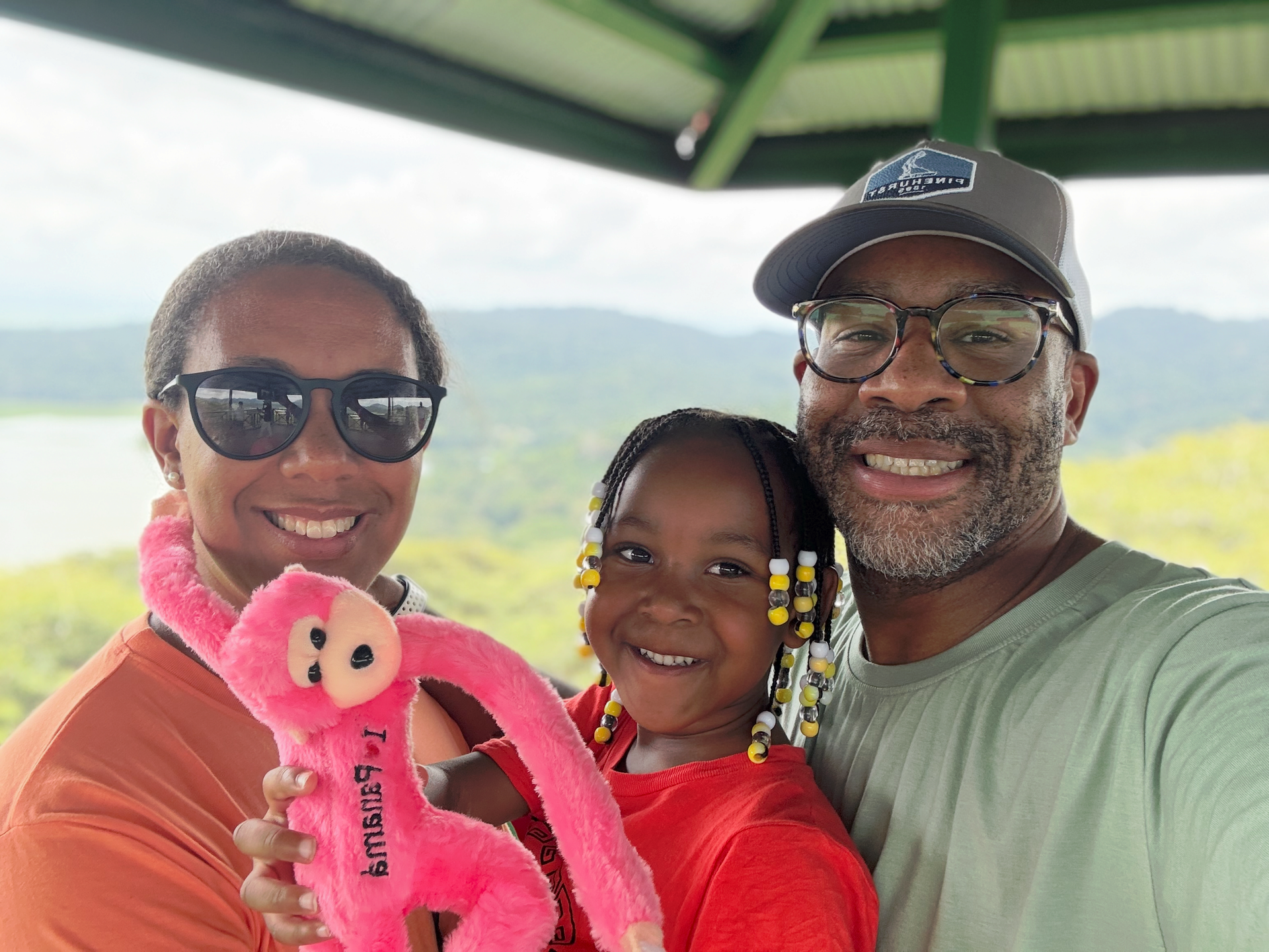 Smiling family - female, male and a child 