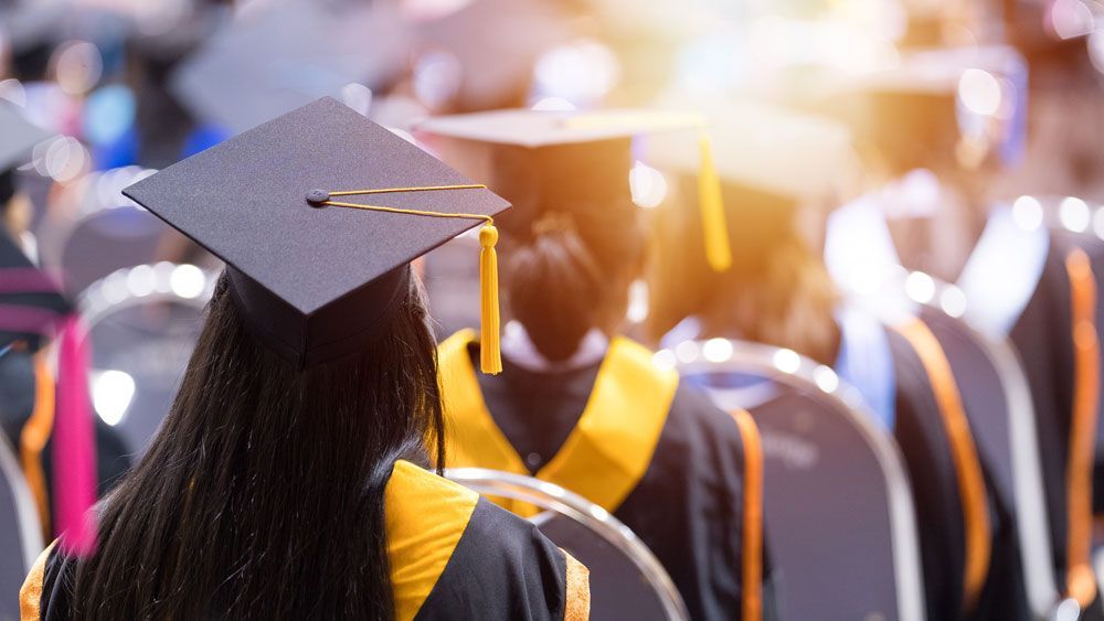 Image of students graduating