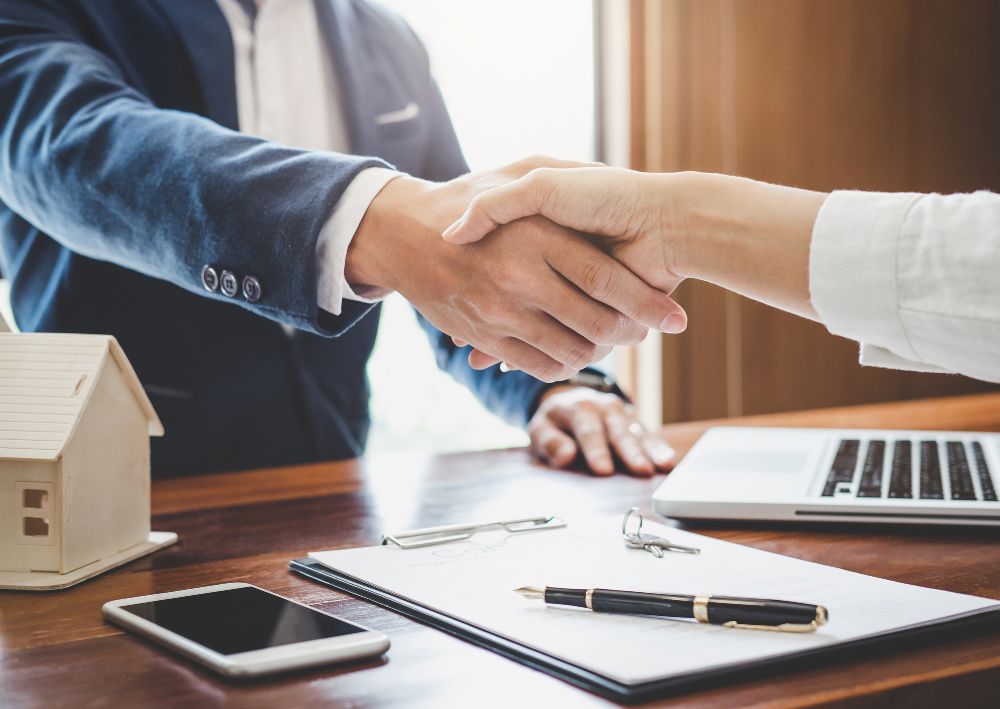 Handshake Deal — Dade City, FL — Larkin & Larking Title Services, LLC