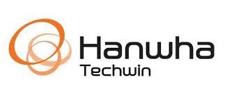 Le logo hanwha techwin est orange et noir sur fond blanc.