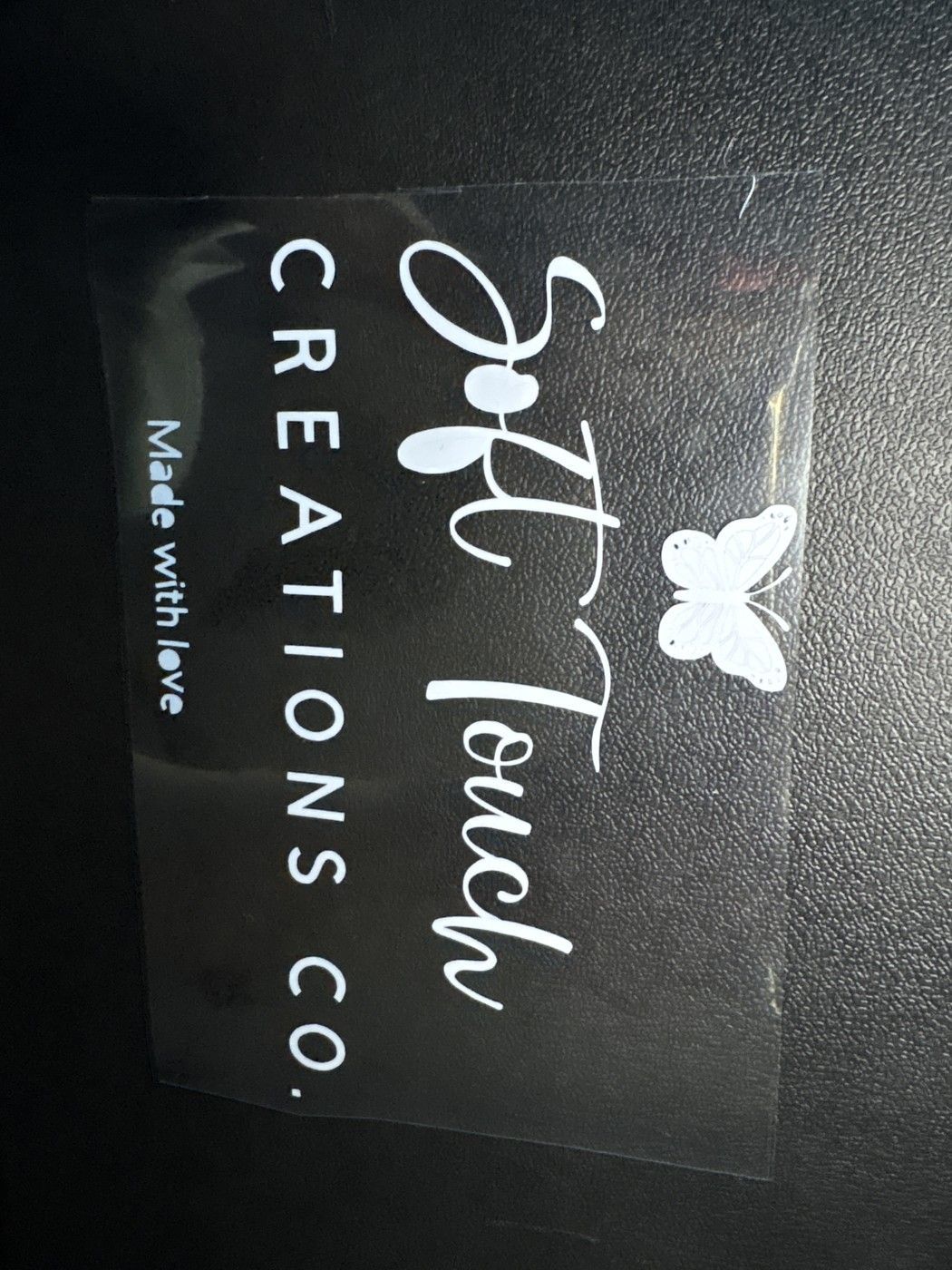 Custom sticker with Soft Touch Creations Co. logo