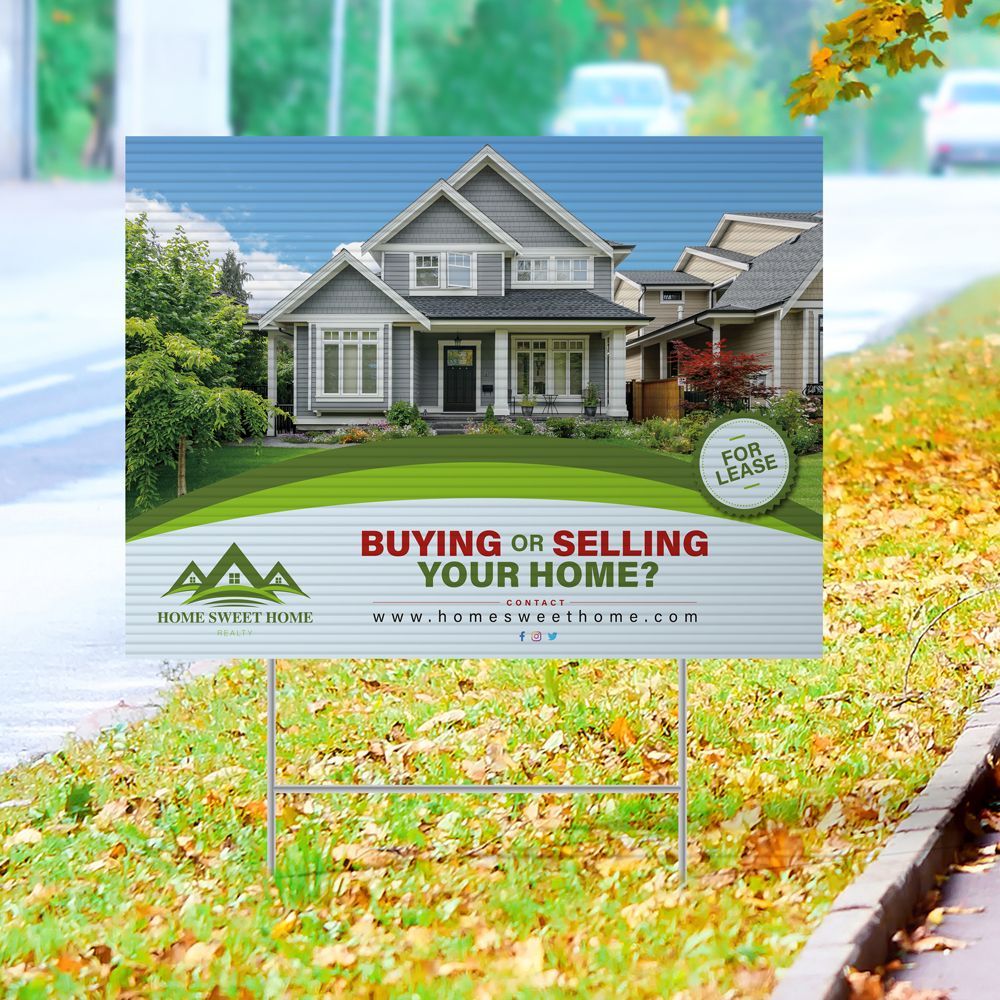 A yard sign that says buying or selling your home A yard sign that says buying or selling your home