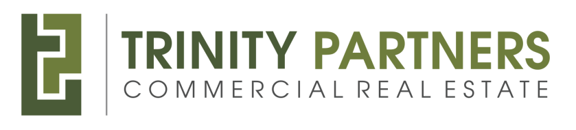A logo for trinity partners commercial real estate