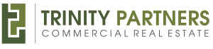 The trinity partners commercial real estate logo is green and white