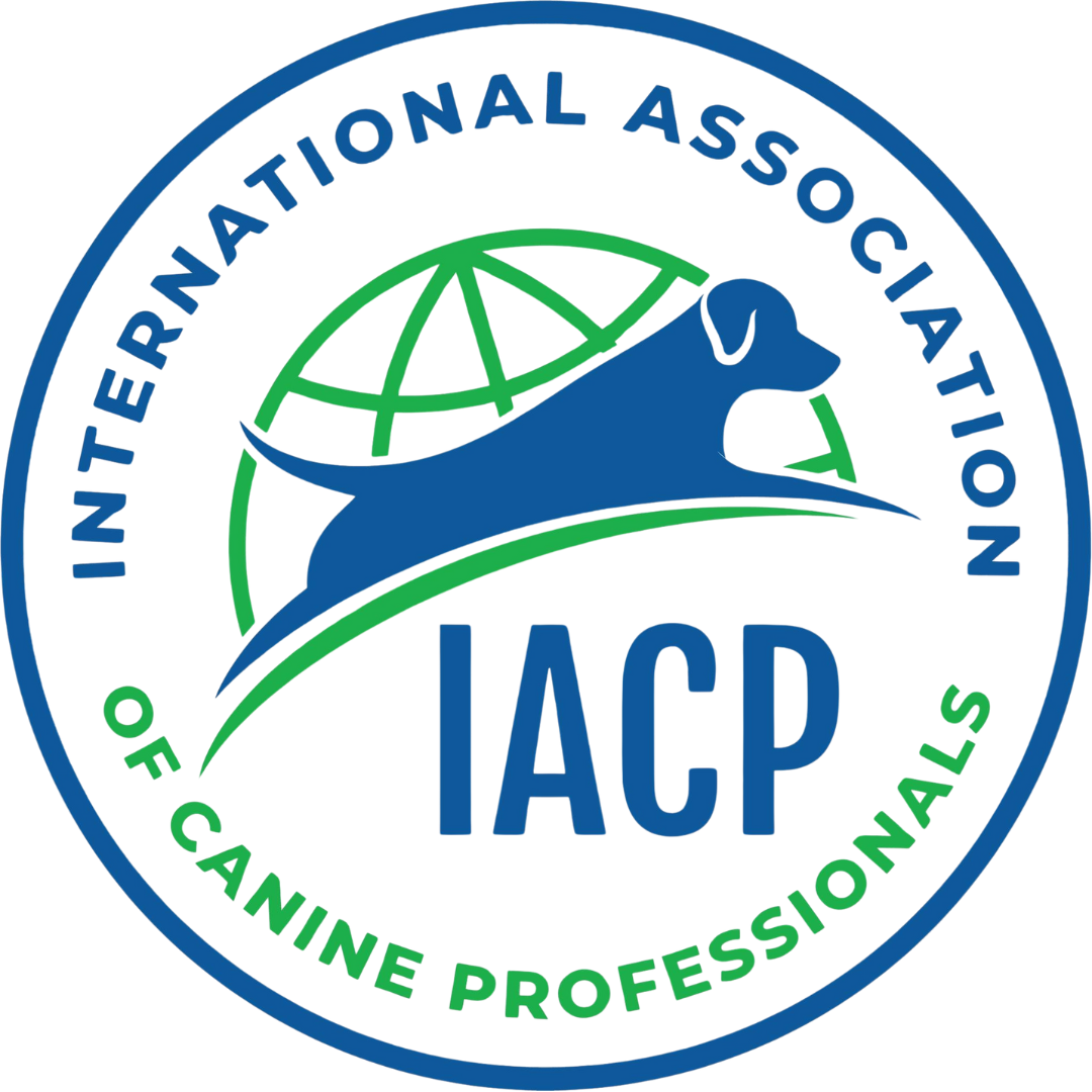 Logo for the International Association of Canine Professionals: A blue dog silhouette on a green globe, with "IACP" in blue.