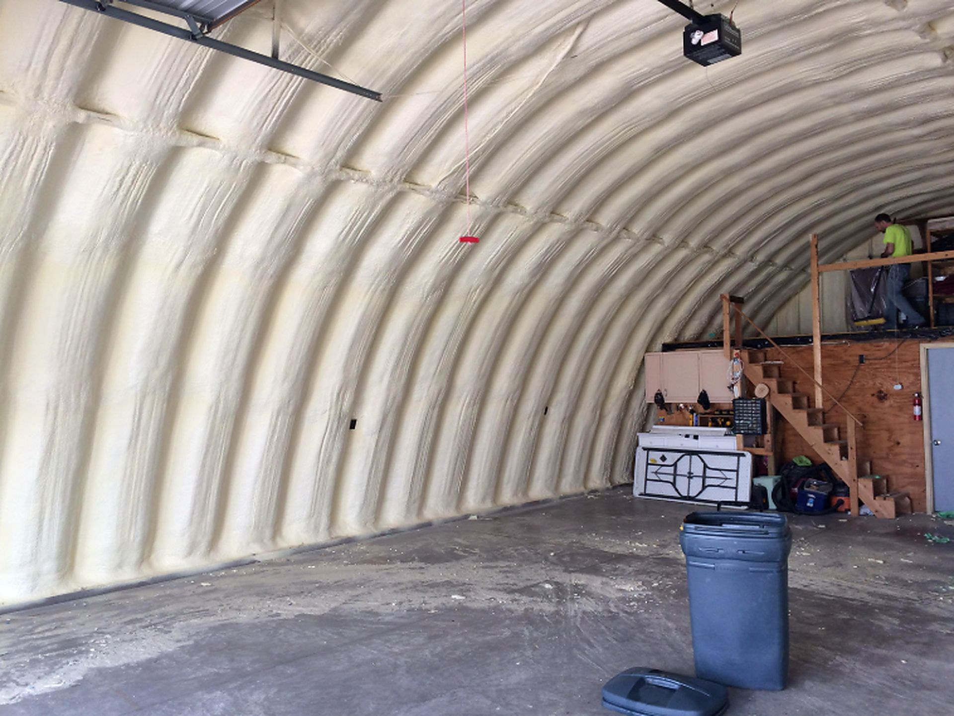 Curved metal interior is coated in spray foam after Spray Foam Insulation Services in Muncie, IN for thermal protection.
