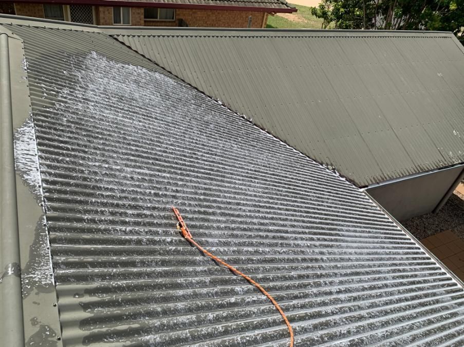 Close Up of a Roof With a Hose Attached to It — CPR Exterior Cleaning in Burnett Heads, QLD