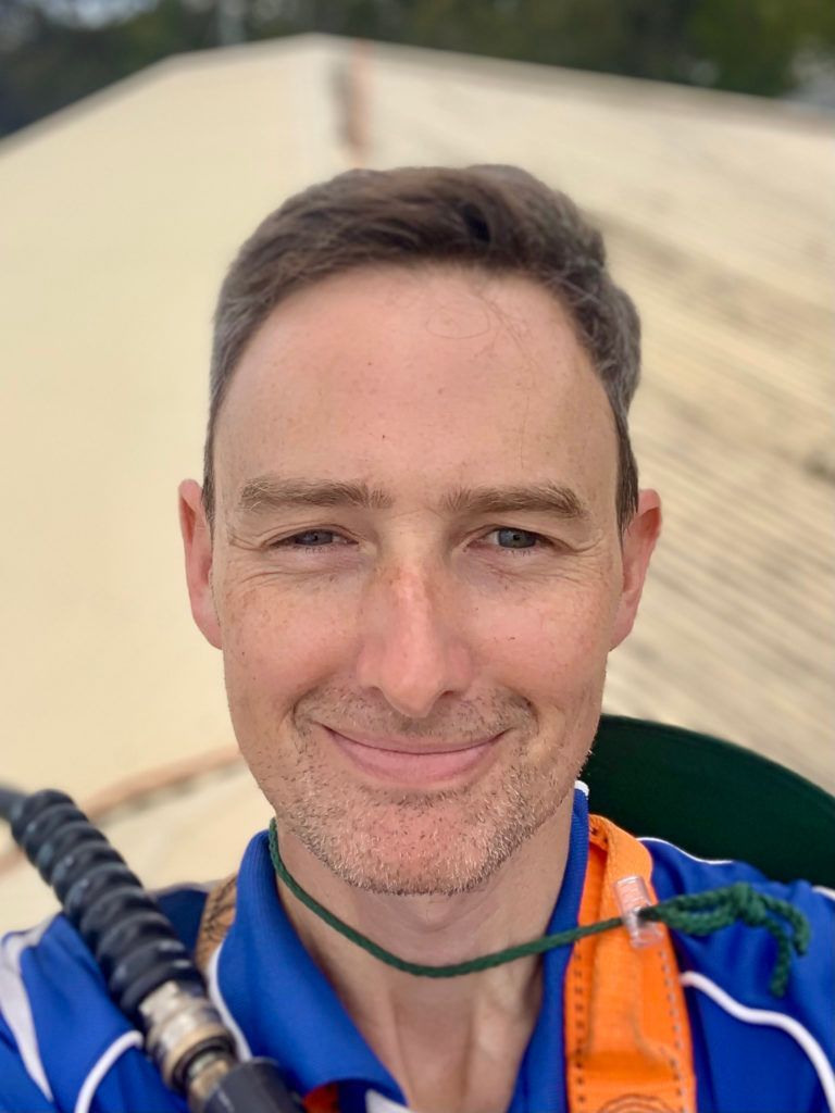 Worker Smiling — CPR Exterior Cleaning in Svensson Heights, QLD
