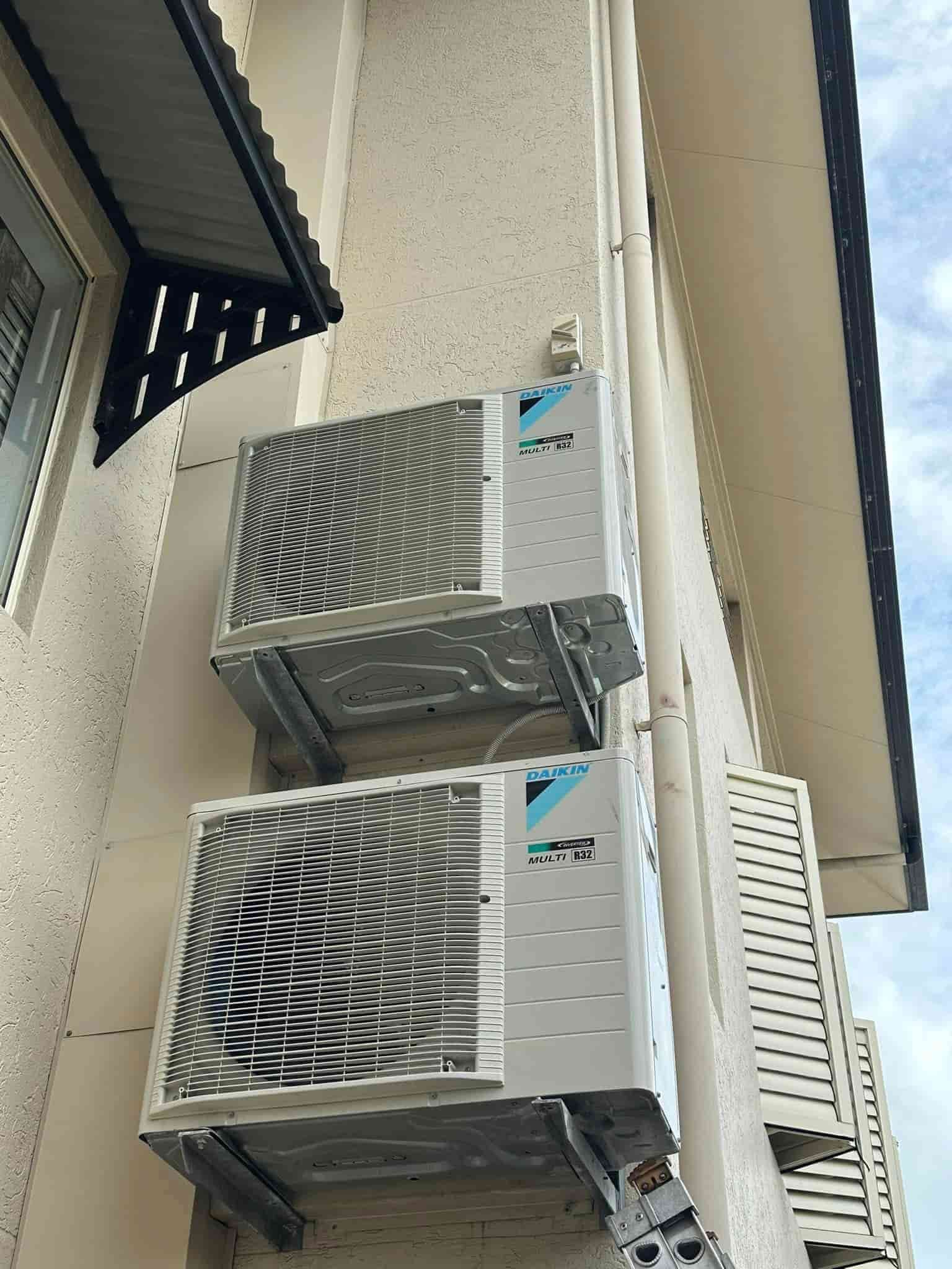 Two Air Conditioning Units Mounted Vertically — Eclipse Air Conditioning and Refrigeration in Trinity Beach, QLD