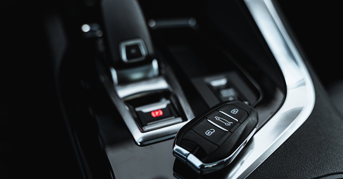 A close up of a car key in a car.
