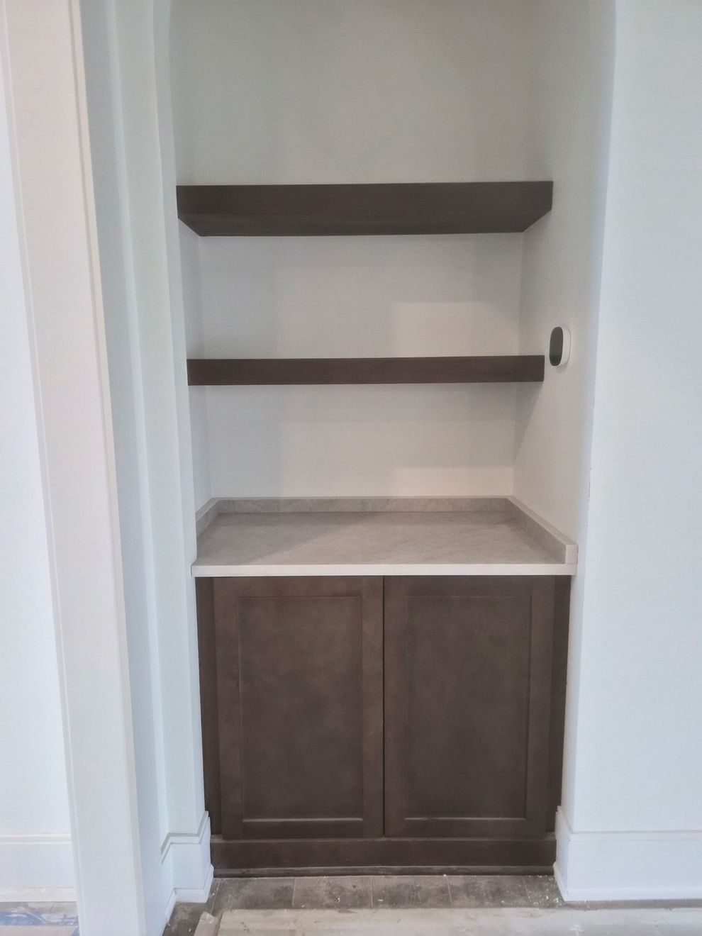 a coffe bar built into a nook