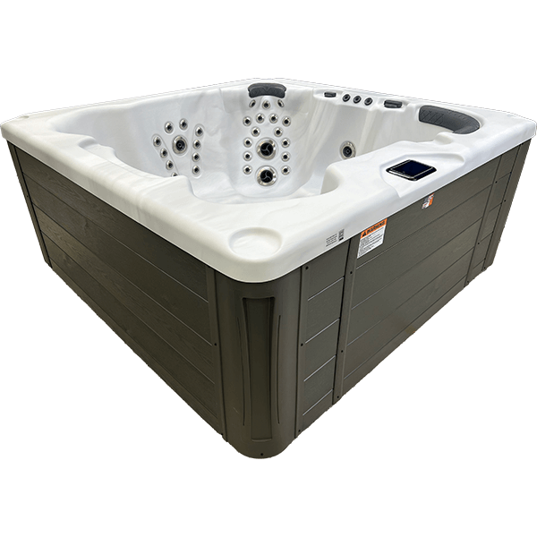 Square white and brown hot tub with built-in seats and jets