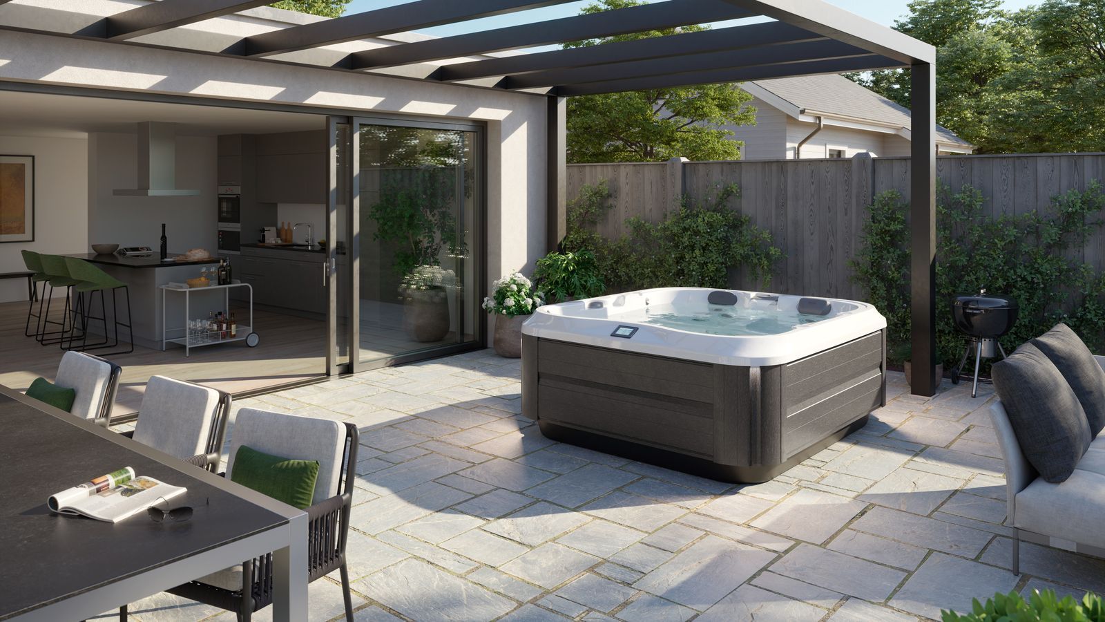 Modern backyard patio with a pergola, outdoor dining set, and a hot tub on stone paving