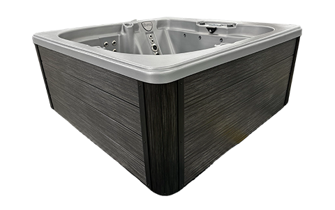 Corner hot tub with dark wood paneling and a silver interior, isolated on white background