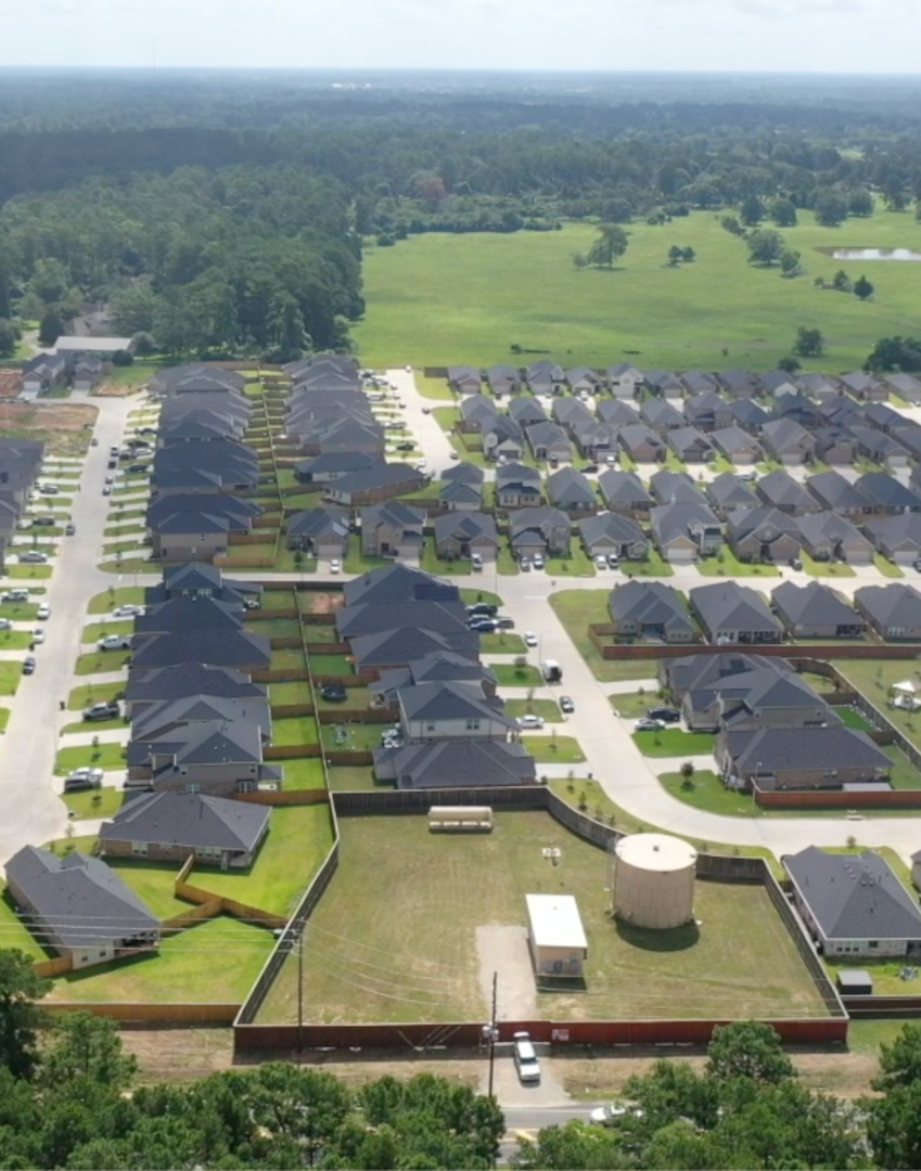 An aerial view of a residential area with lots of houses