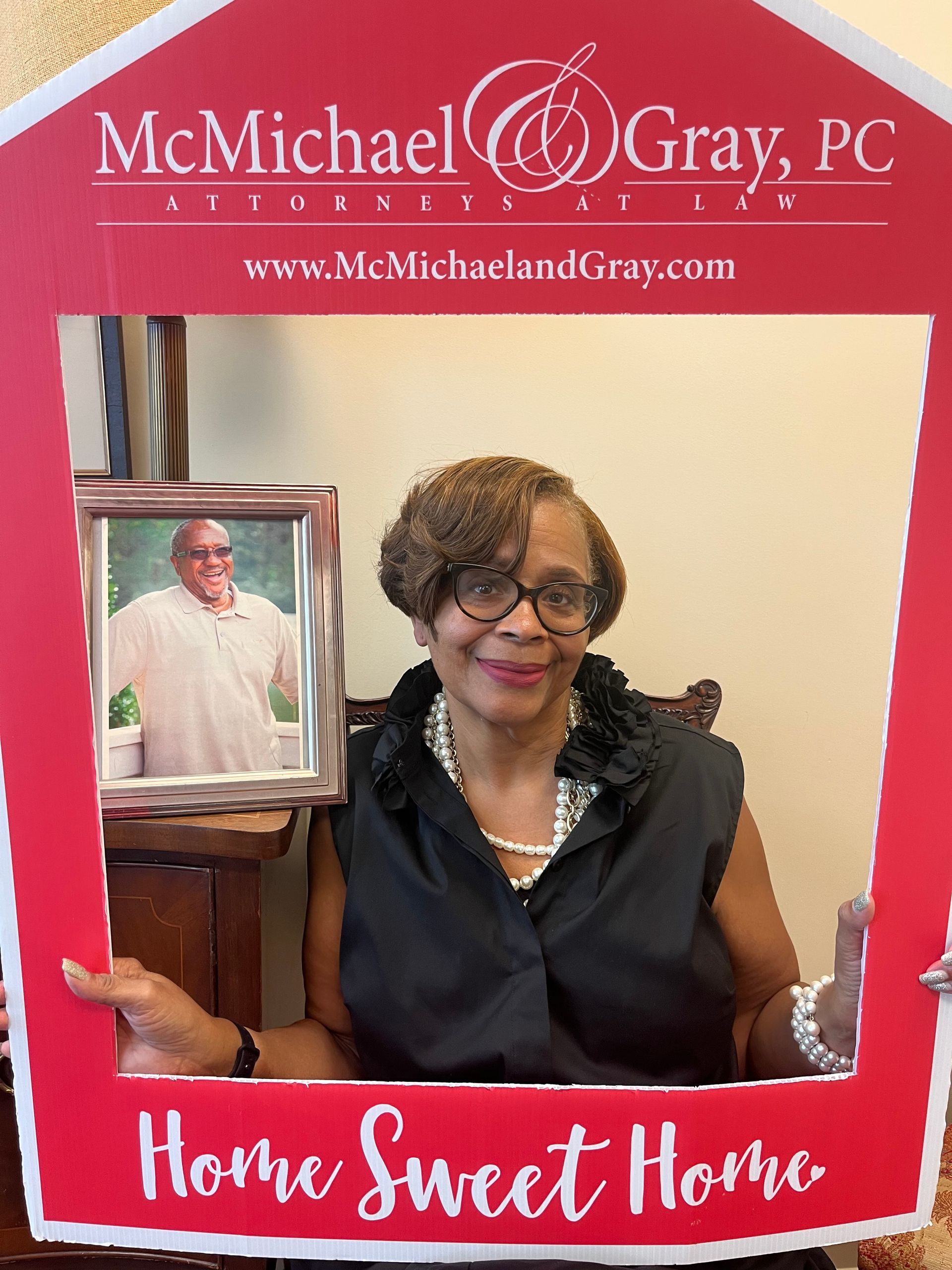 Rhonda Martin, Georgia Realtor client holding a